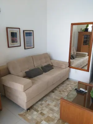 Uma área de estar em Flat Beira Mar Golden Fortaleza