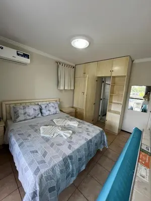 Uma cama ou camas num quarto em Aquaville Resorts Vista Piscina