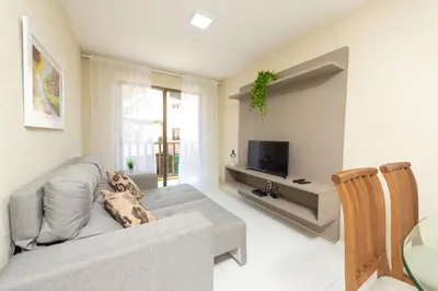 Uma televisão e/ou sistema de entretenimento em Dei Fiori Guaramiranga
