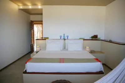 Uma cama ou camas num quarto em maison au zenit