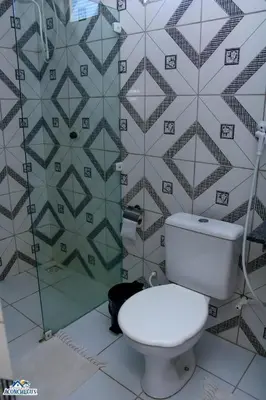 Uma casa de banho em Pousada aconcheg'us