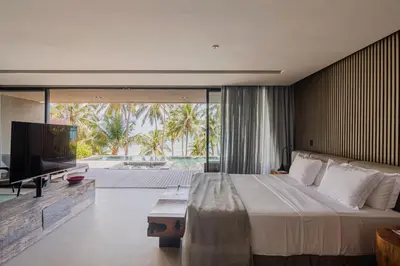 Uma cama ou camas num quarto em Carmel Taíba Exclusive Resort