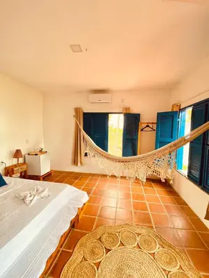 Uma cama ou camas num quarto em Montepascual Ecovillage