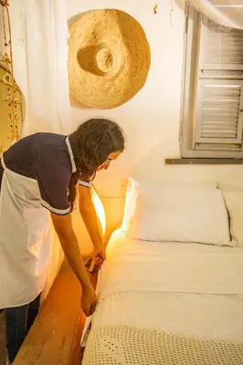 Uma cama ou camas num quarto em Chalé da sereia Casa-Hotel-Oásis no centro de jericoacoara