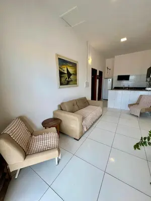 Uma área de estar em Casa da Juma
