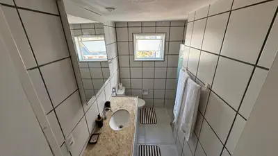 Uma casa de banho em Apartamento Praia de Iracema com vista mar