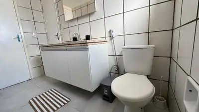 Uma casa de banho em Apartamento Praia de Iracema com vista mar