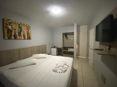Uma televisão e/ou sistema de entretenimento em Hotel Fortaleza Inn