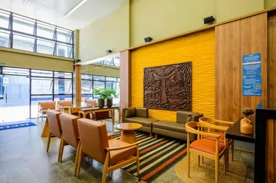 Uma área de estar em Nordeste Palace Hotel - Fortaleza