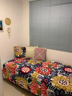 Uma cama ou camas num quarto em Solarium Residence