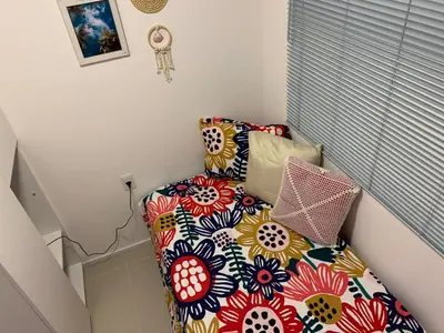 Uma cama ou camas num quarto em Solarium Residence