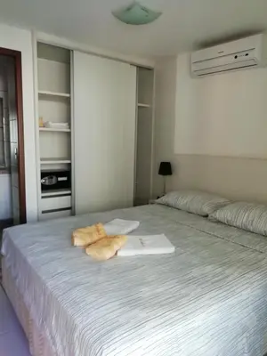 Uma cama ou camas num quarto em Beach Class Rosalux 707
