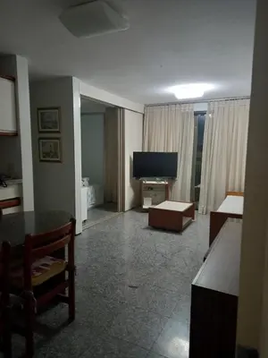 Uma cama ou camas num quarto em Hotel Flat Atlântico
