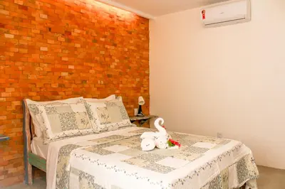 Uma cama ou camas num quarto em Casa Mirella Jeri