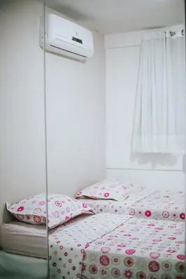 Uma cama ou camas num quarto em Apto 60m, perto da feirinha, Meirelles