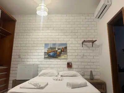 Uma cama ou camas num quarto em La Vista Kite Preá