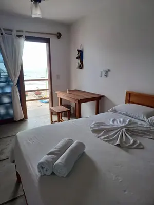 Uma cama ou camas num quarto em La Vista Kite Preá