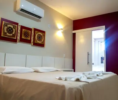 Uma cama ou camas num quarto em Murano Center Hotel