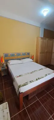 Uma cama ou camas num quarto em Casa Strela Jericoacoara