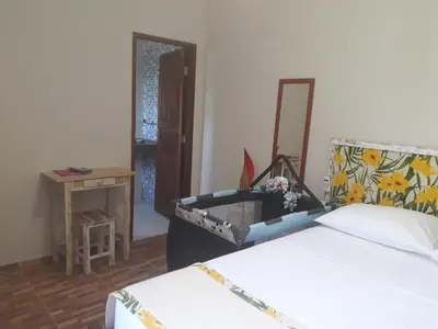 Uma cama ou camas num quarto em Casa Strela Jericoacoara