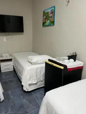 Uma cama ou camas num quarto em Pousada da Celma