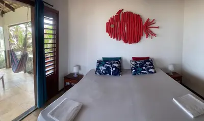 Uma cama ou camas num quarto em Casa do Capitao