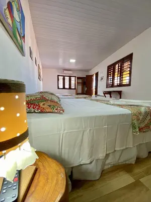 Uma cama ou camas num quarto em Pousada São Pedro