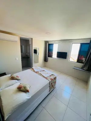 Uma cama ou camas num quarto em Iracema Mar Hotel