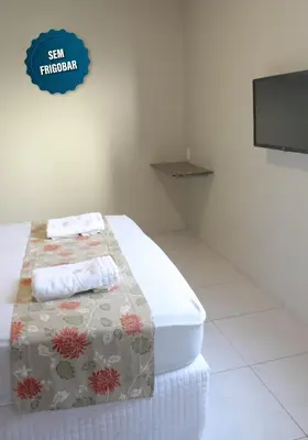 Uma cama ou camas num quarto em Iracema Mar Hotel