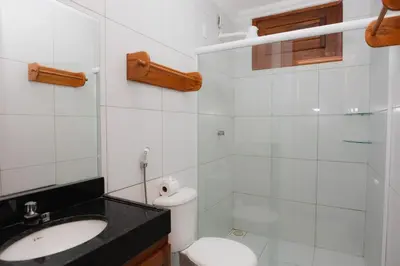 Uma casa de banho em Pousada SandBeach