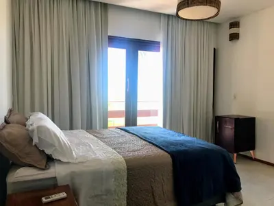 Uma cama ou camas num quarto em Junduh Brasil Pousada e Restaurante