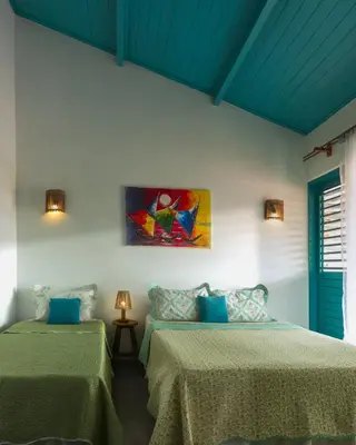Uma cama ou camas num quarto em Pousada AGUA SALGADA