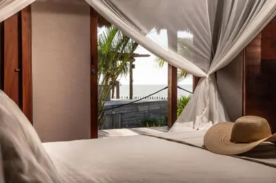 Uma cama ou camas num quarto em Kabana Hotel