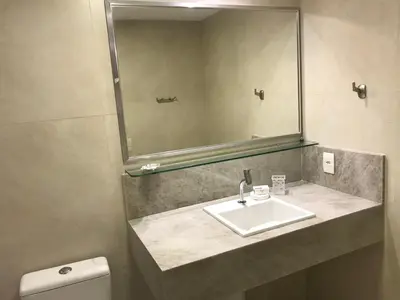 Uma casa de banho em Apartamento térreo Aquaville