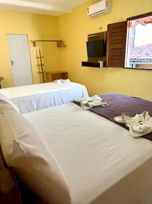 Uma cama ou camas num quarto em Hotel Preá