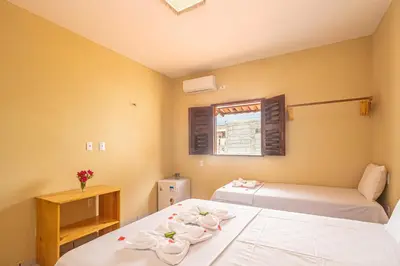 Uma cama ou camas num quarto em Hotel Preá