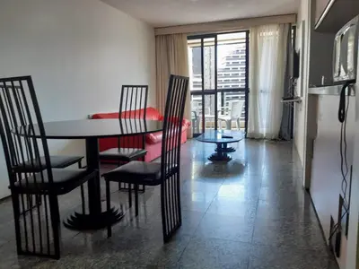Uma área de estar em Hotel Flat Atlântico, Apartamento Com 02 Quartos