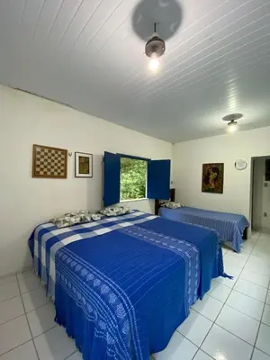 Uma cama ou camas num quarto em Rancho Manacá
