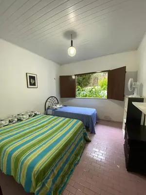 Uma cama ou camas num quarto em Rancho Manacá
