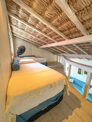 Uma cama ou camas num quarto em Nordestina Loft