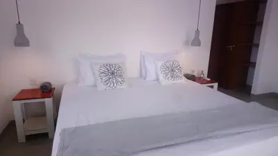 Uma cama ou camas num quarto em KiteBar Hotel