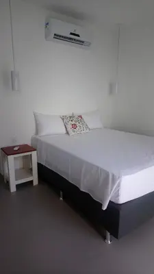 Uma cama ou camas num quarto em KiteBar Hotel