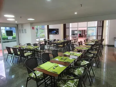 Um restaurante ou outro lugar para comer em Beach Class Exclusive