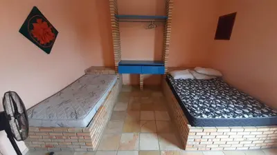 Uma cama ou camas num quarto em Flat Casa Taiba 2001