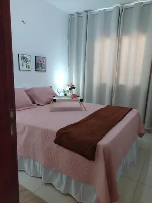 Uma cama ou camas num quarto em Vila Mulungu Flats