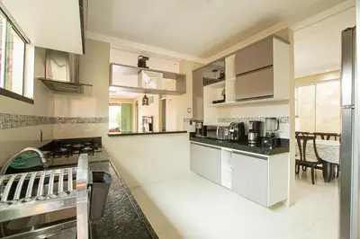A cozinha ou kitchenette de Porto das Dunas Casa Temporada Estilo e Conforto