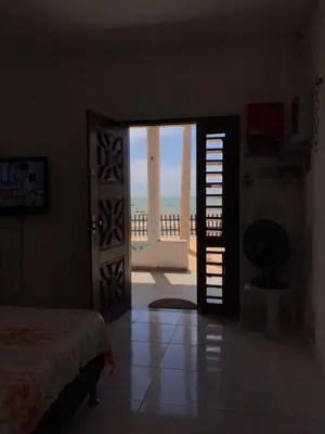 Uma cama ou camas num quarto em Praia da Baleia Itapipoca CE