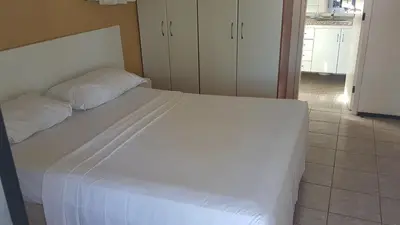 Uma cama ou camas num quarto em Aquaville Resort Porto Das Dunas block 63