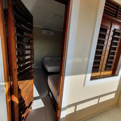 Uma área de estar em Casa na Praia de Águas Belas - Caponga