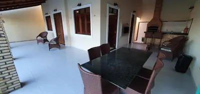 Uma área de estar em Casa na Praia de Águas Belas - Caponga